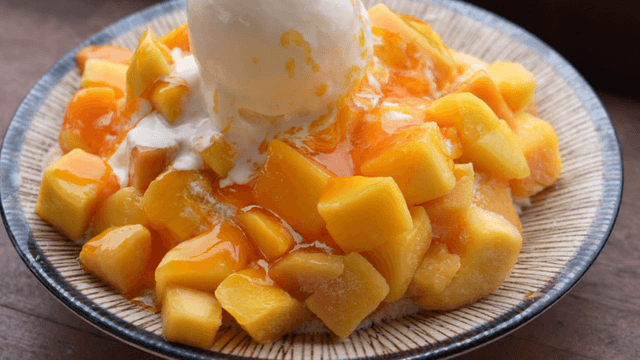 Mango bingsu topped with ice cream