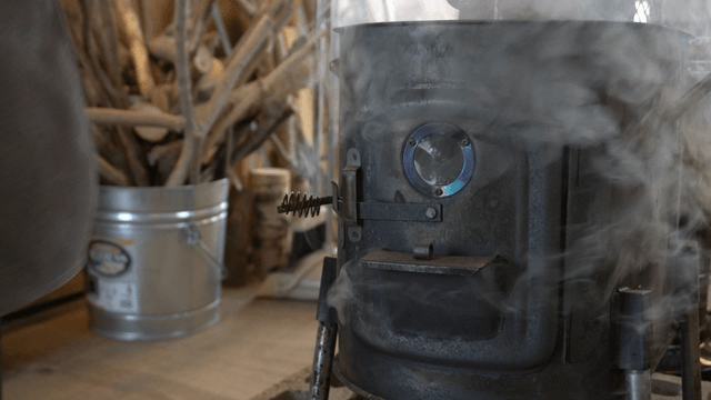 Stove burning with firewood