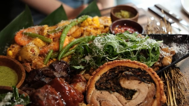 A barbecue plate with a variety of foods