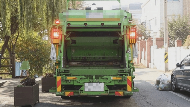 Garbage truck on a residential street
