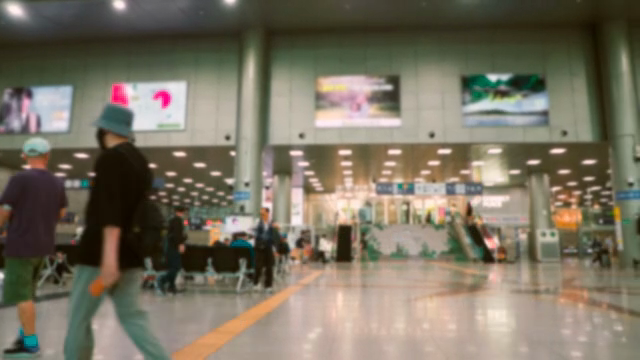 busy train station with people waiting
