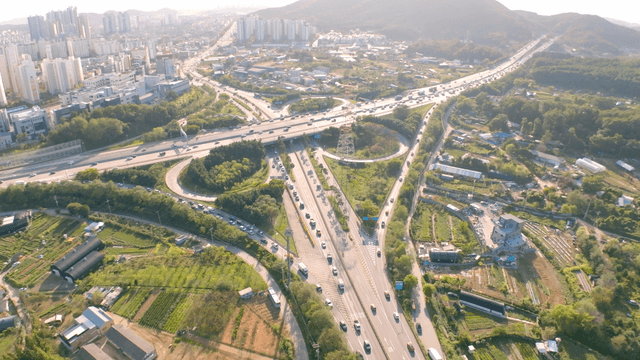 Busy highway interchange connected to the city