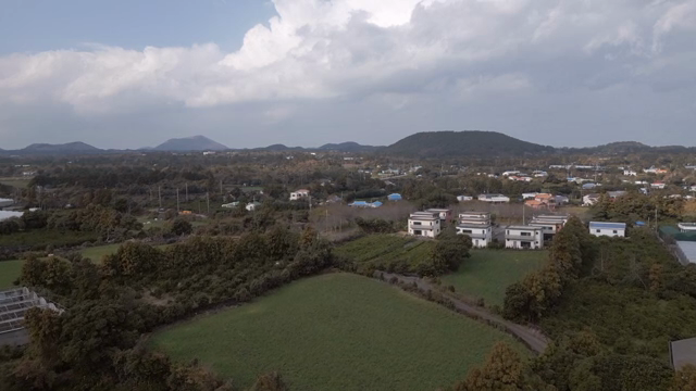 A rural landscape with farms and houses