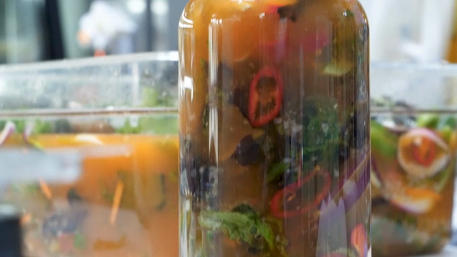Water kimchi in a glass jar