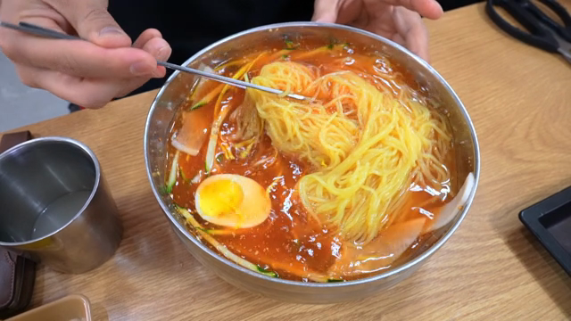 A bowl of spicy Korean  Cold Buckwheat Noodles