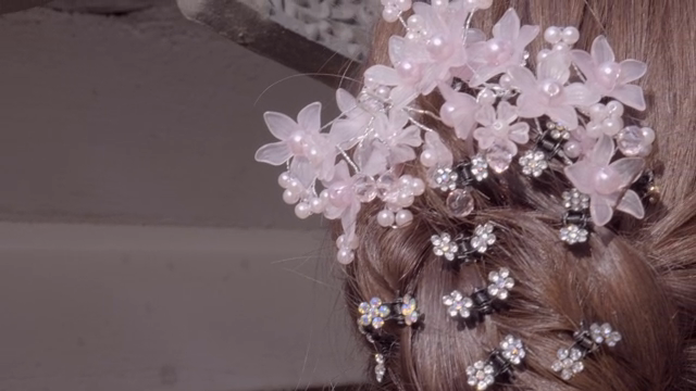A woman with a fancy headdress
