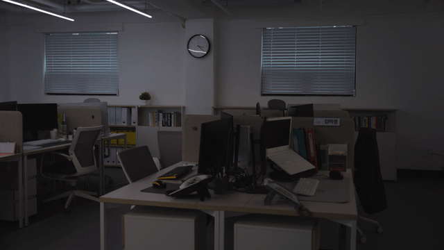 Empty office with computers and desks