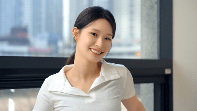 Smiling woman in a bright room