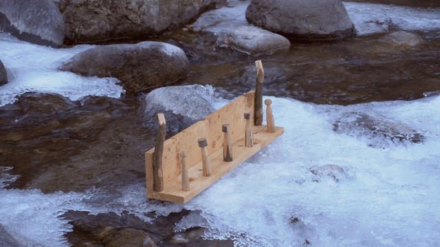 Wooden stand on an icy river