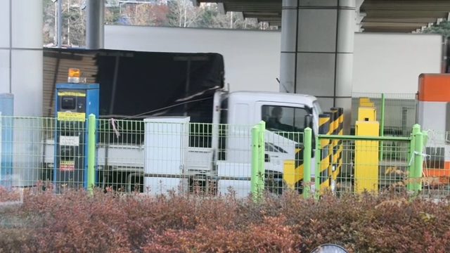 Truck passing through a toll gate