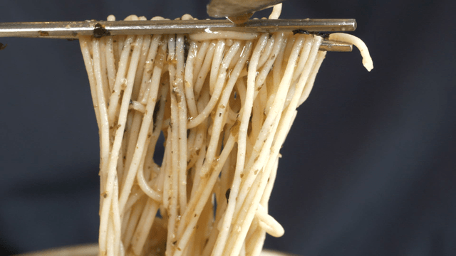 Chopsticks picking up perilla oil buckwheat noodles