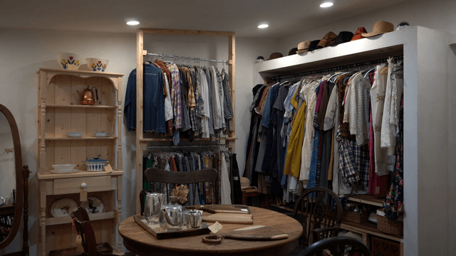 Cozy wardrobe with clothes and decor