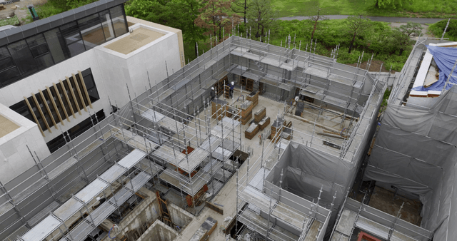 Construction site with scaffolding and workers