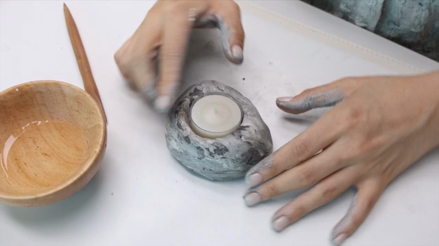 Crafting a candle holder with clay