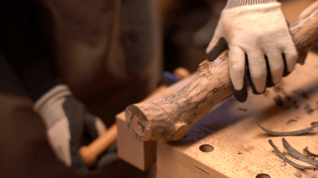 Wood being carefully sawed in a workshop