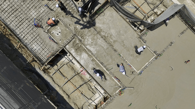 Concrete being poured at a construction site