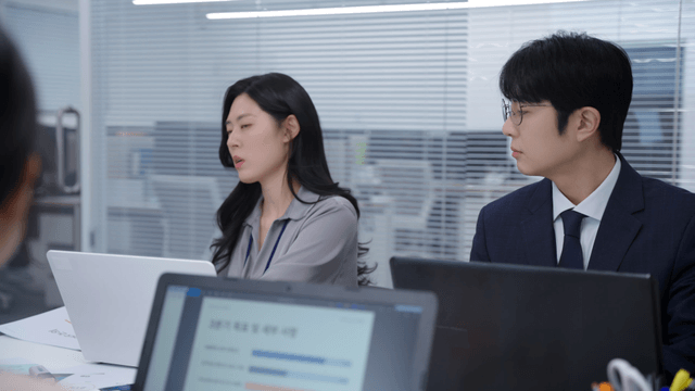 Office meeting with focused discussion