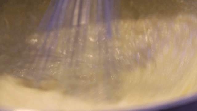 Whisking batter in a pot