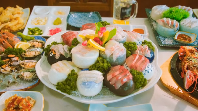 A variety of fresh seafood dishes on a table