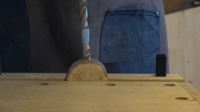 Woodcraft artisan working with a drill