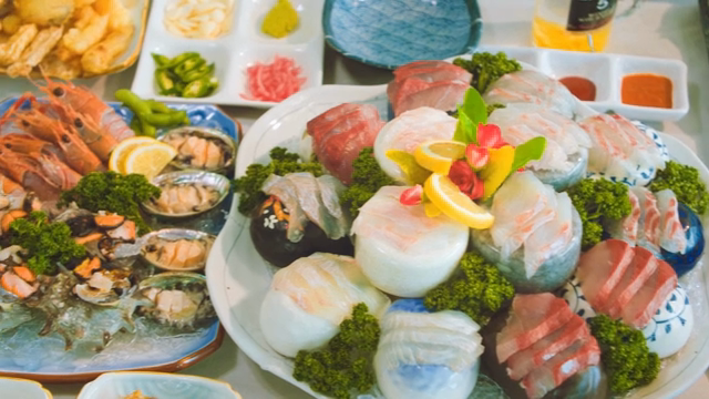 A variety of fresh seafood dishes on a table