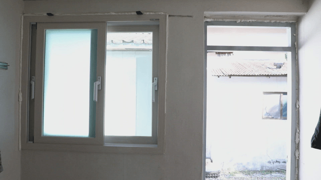 Interior view of a room with windows