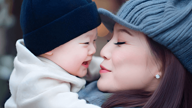 Joyful moment between mother and baby