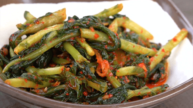 Spicy seasoned young radish kimchi on a plate