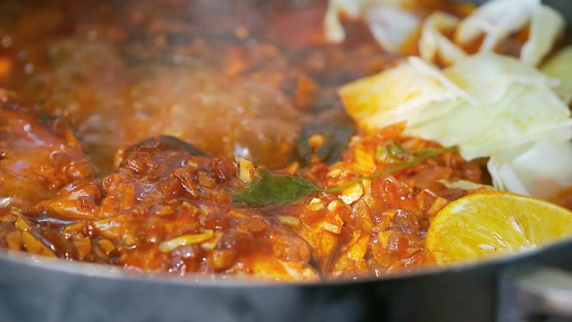 Simmering stew with rich sauce and vegetables