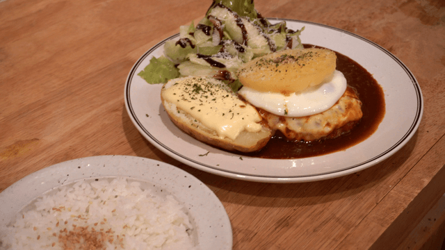 Plate with hamburger steak and salad