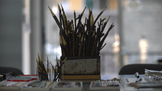 Wooden branch pencil sculpture on art activity table