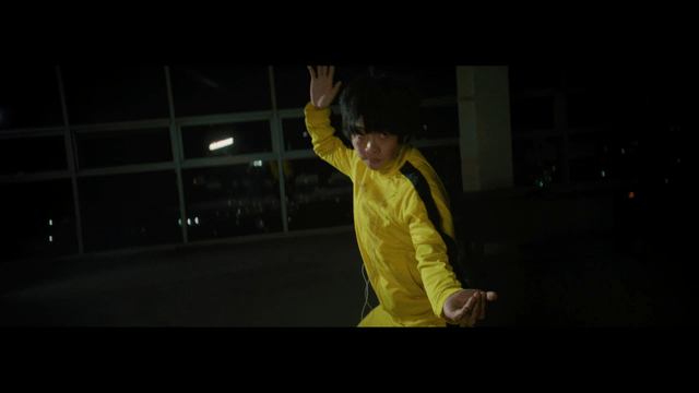 Person performing a traditional martial arts move
