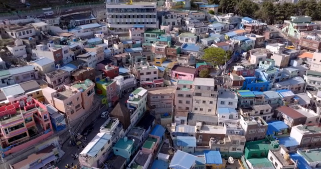Colorful hillside village with vibrant rooftops