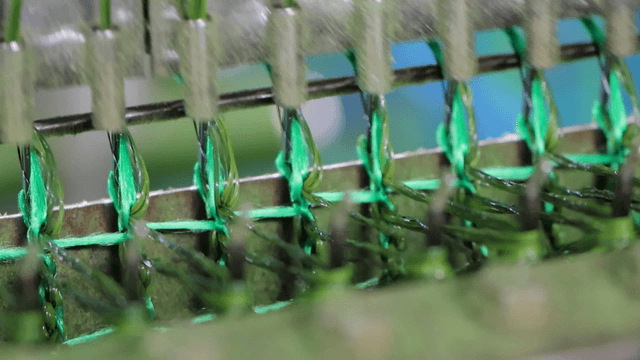 Green threads precisely woven on machine