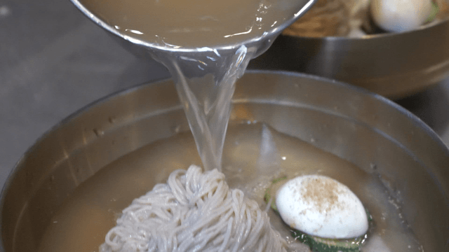 Cold broth poured over buckwheat noodles