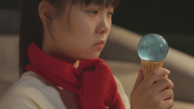 Girl tasting a unique ice cream cone
