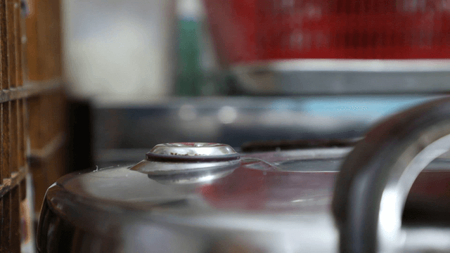 Pressure cooker in a kitchen setting
