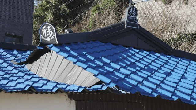 Traditional Korean roof with blue tiles