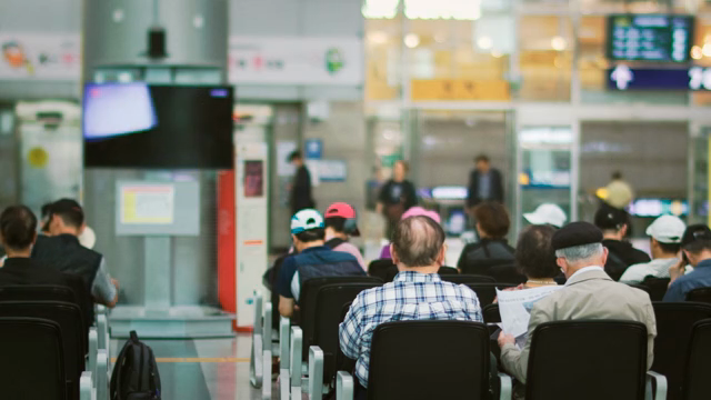 People waiting in an train terminal