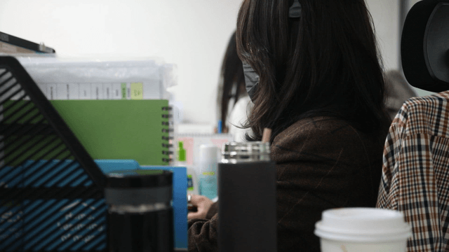 Office workers focused on their tasks