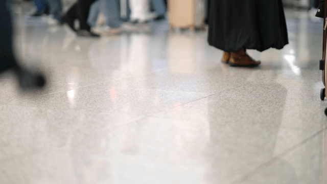 People walking in a busy airport terminal