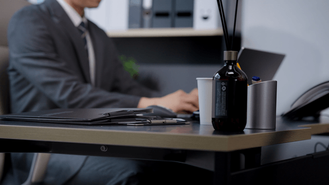 A person working at a desk in an office