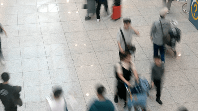 People walking in a busy terminal