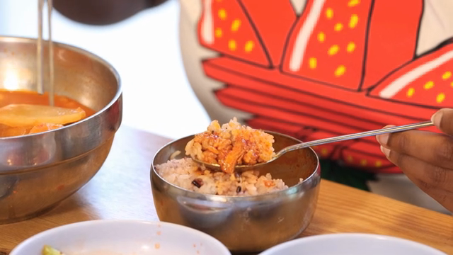 Eating Korean rice with kimchi jjigae