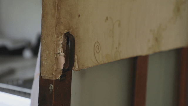 Old wooden furniture with marks of damage