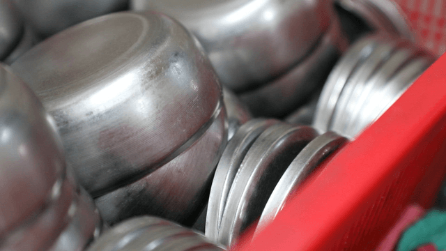 Stacked stainless steel bowls in a kitchen