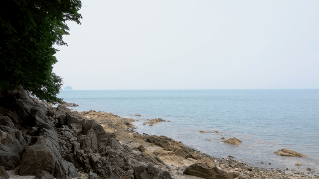 Rocky shoreline with calm sea