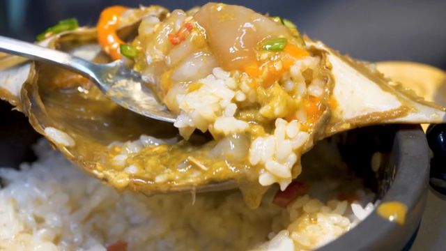 Soy Sauce Marinated Crabwith rice and sesame seeds