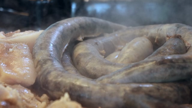 Korean sausage steaming in a pot