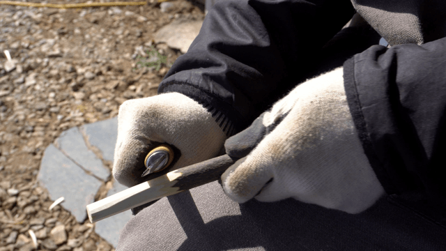 Hand carving wood with a knife